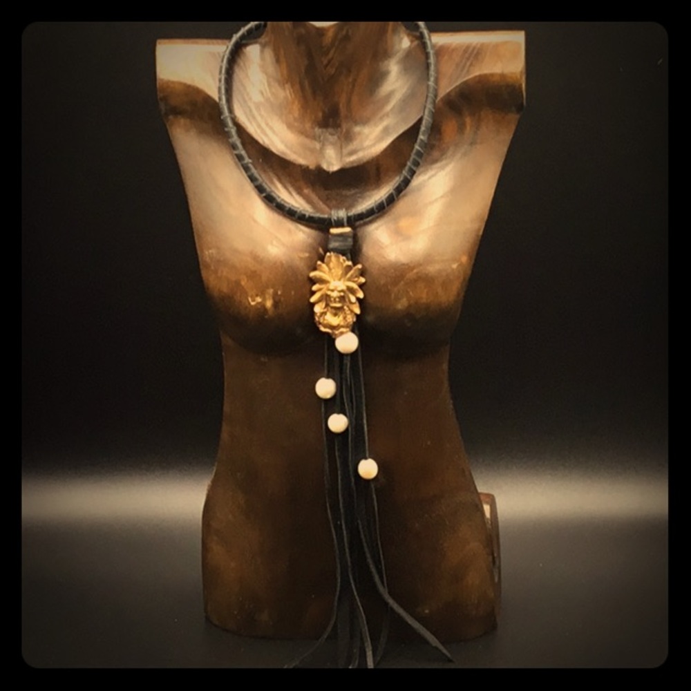 Leather wrapped neck wire with tassel drop